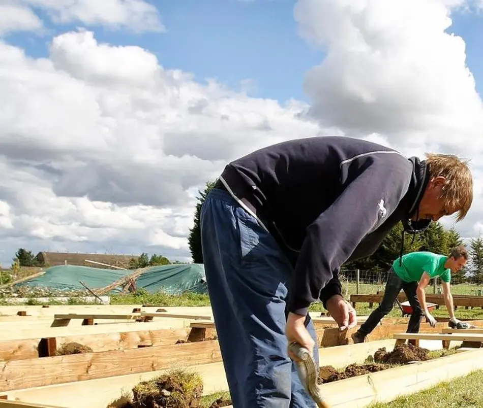 Volunteers on new community park build qualifications