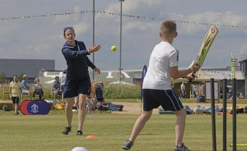 A game of cricket at the Pavilion 